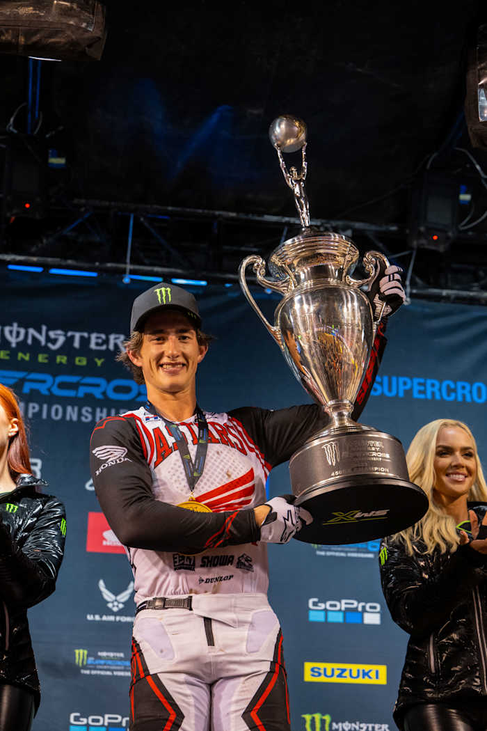 An ecstatic Chase Sexton celebrates winning the 2023 Supercross championship Saturday in Salt Lake City. Photo: Feld Motor Sports/Align Media.